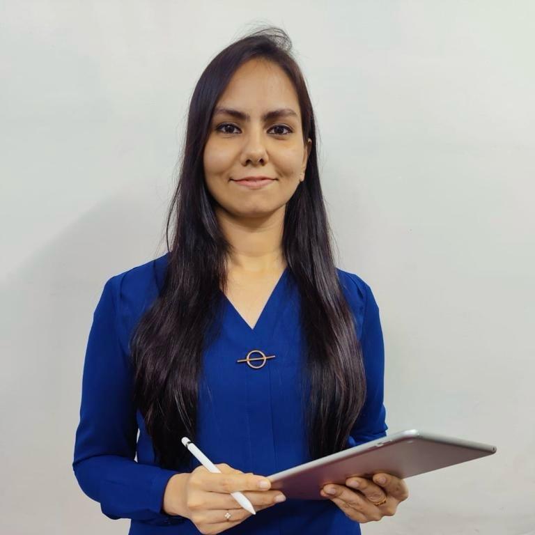 Deepti Balagopal, COO at Here and Now AI, in a modern office setting