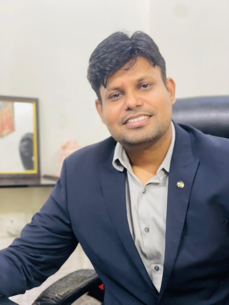 Ruthran Raghavan, CEO & Chief AI Scientist at Here and Now AI, in a formal portrait