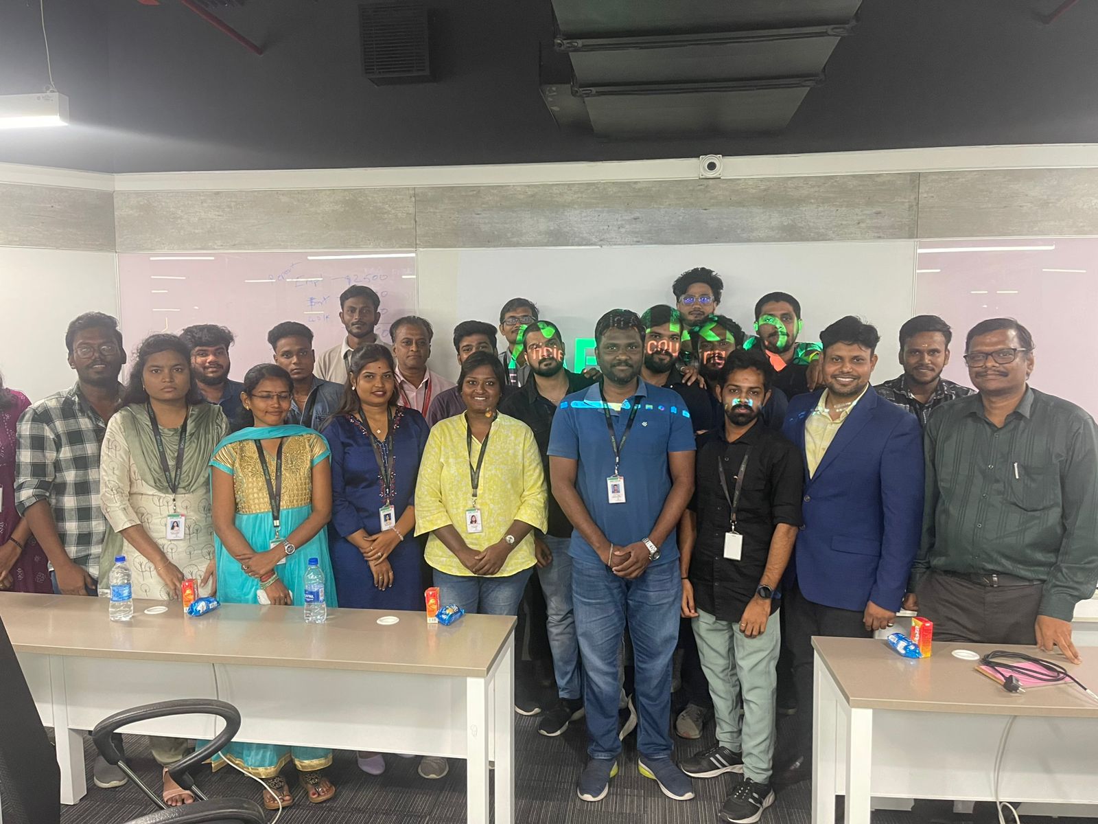 Group photo of HERE AND NOW AI trainers and METRIQE SOLUTIONS participants after completing corporate AI training.